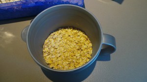 1/2 to 1/3 cup of rolled oats.