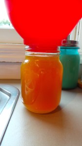 Mason jar of chicken stock