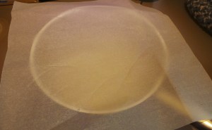 Use a sheet of parchment paper to seal off any leaks of heat and water.