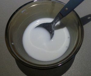 Using cold water, mix to a slurry.