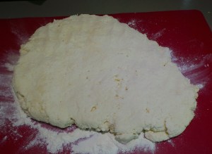 Shape and flatten your dough, using only your hands.