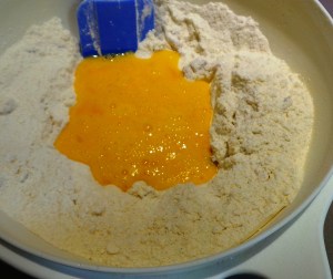 Add your egg mix to your flour mix...
