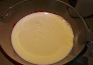 I heat my yoghurt in the microwave, using a large pyrex jug.