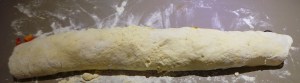 Roll it as tightly as you can, while still being gentle with the dough.