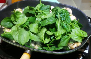 Waiting for the spinach to wilt.