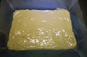 Trim the paper after you've filled the tin. 