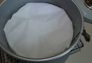 Lower the base into the tin.