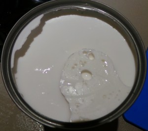 Spoon the solids into your pan.